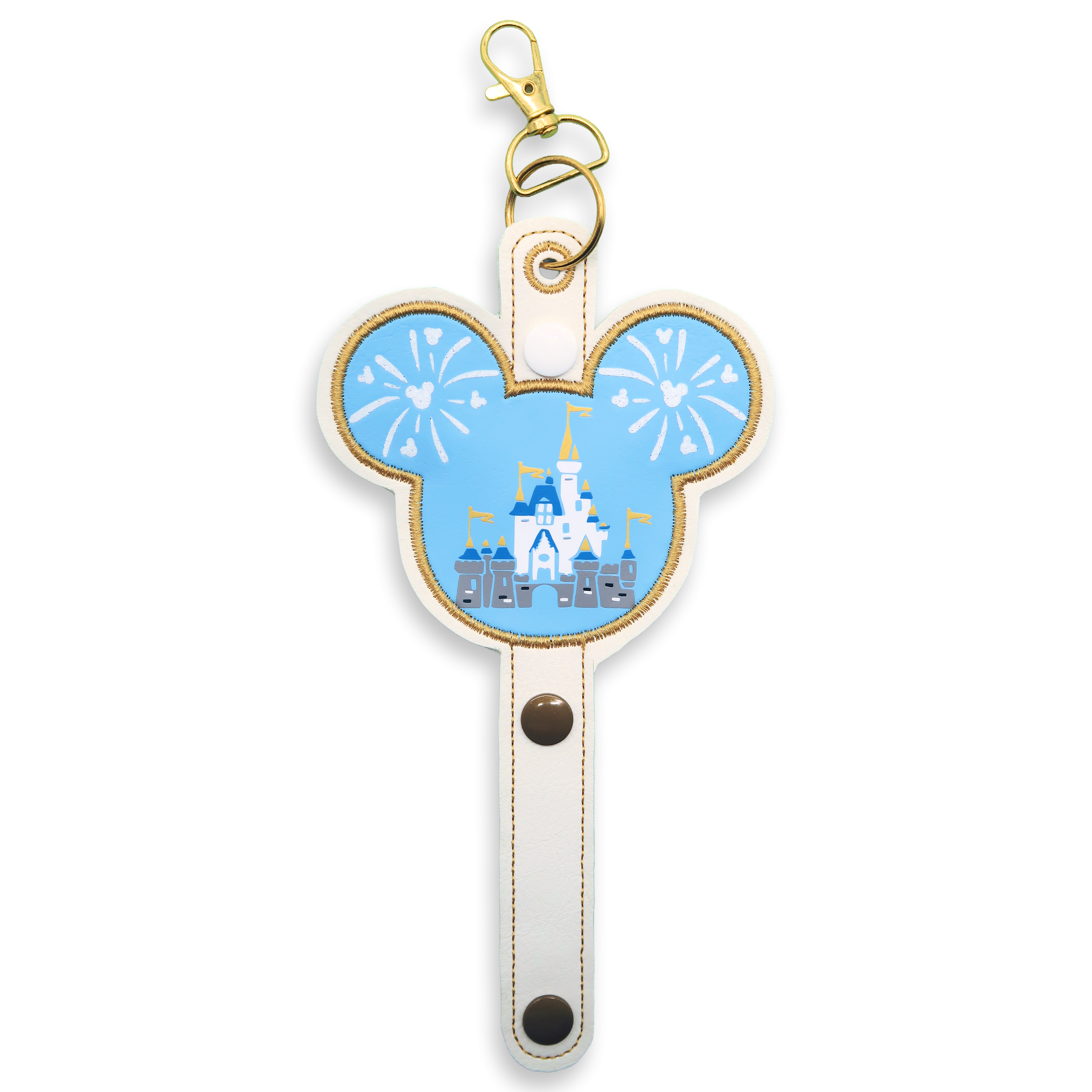 Ear holder with Mickey Mouse head design featuring a castle and fireworks on a blue background.