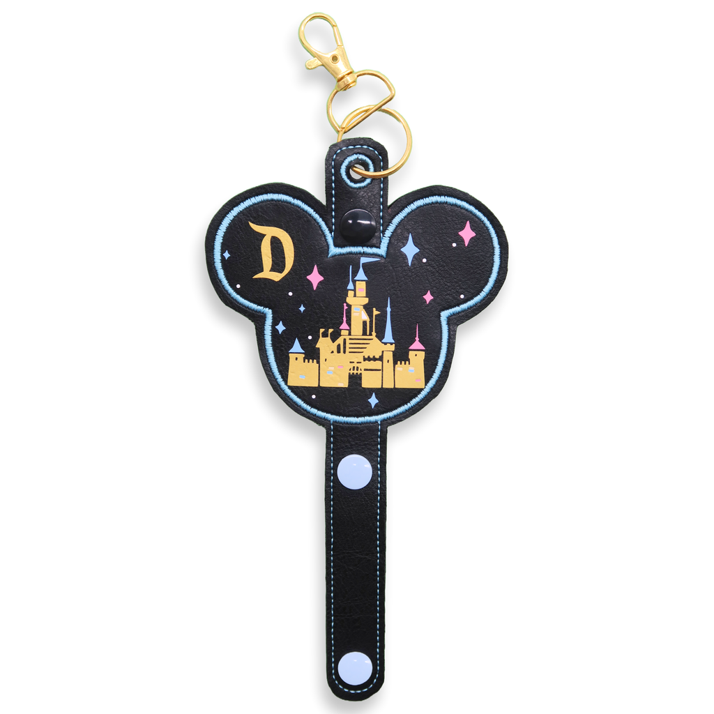 Ear holder with Mickey Mouse ears design featuring a castle and the letter 'D' for Disneyland on a white background.
